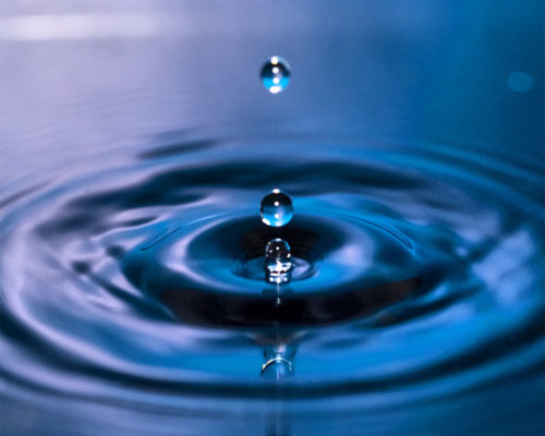 water drop falling on surface